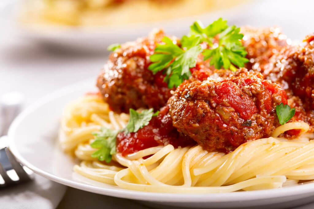 spaghetti pasta with meatballs and parsley