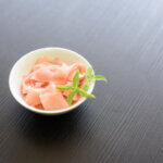 Pink ginger in a white bowl