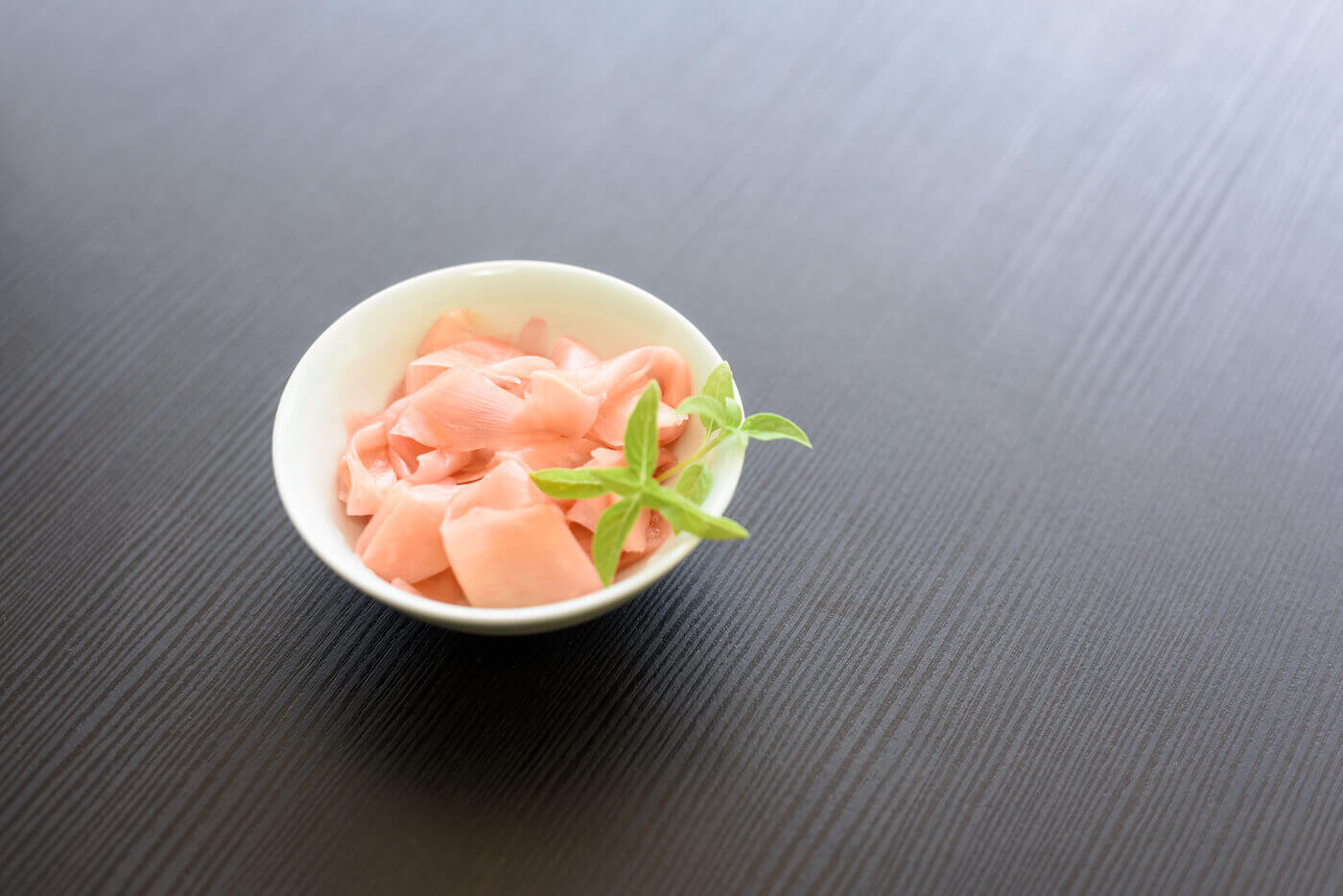 Pink ginger in a white bowl