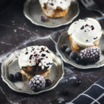 Blueberry and blackberry muffins with white frosting