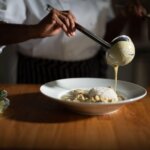 Chef plating thai green curry