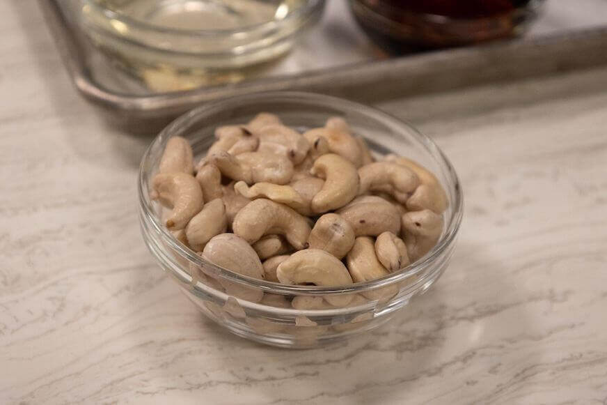Cashews in a small glass bowl