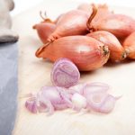 Thinly sliced shallots are the key to quick pickling.