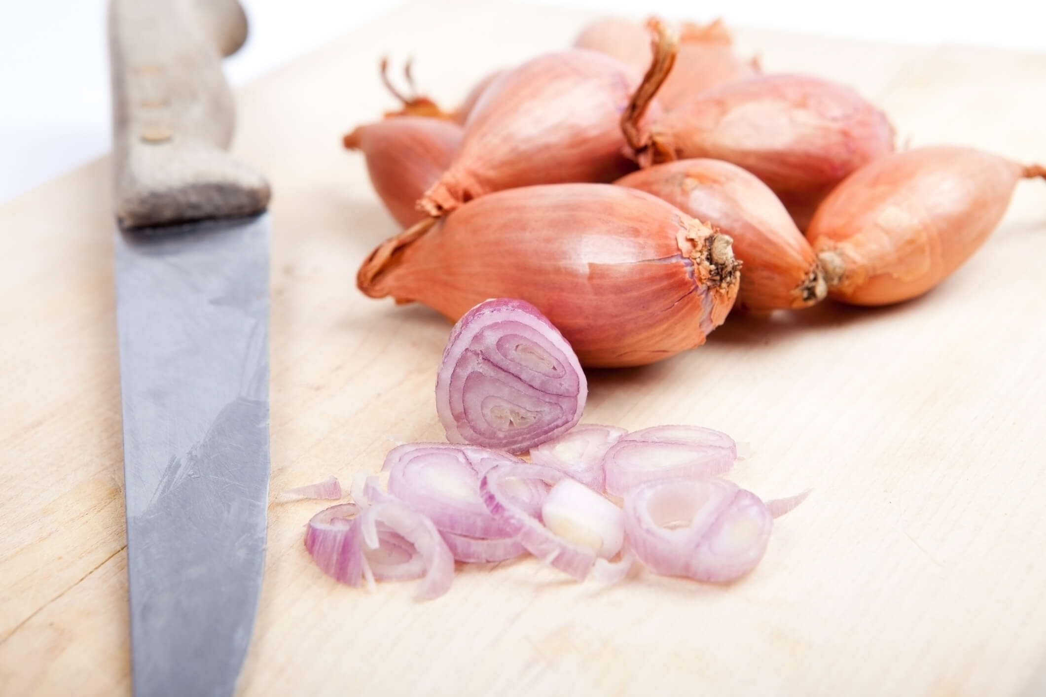 Thinly sliced shallots are the key to quick pickling.