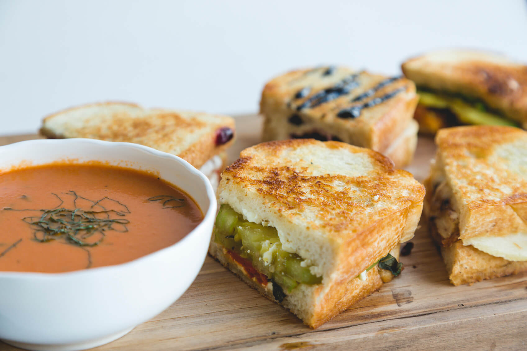 No matter the flavor of your grilled cheese, they all go well with a big bowl of tomato bisque soup.