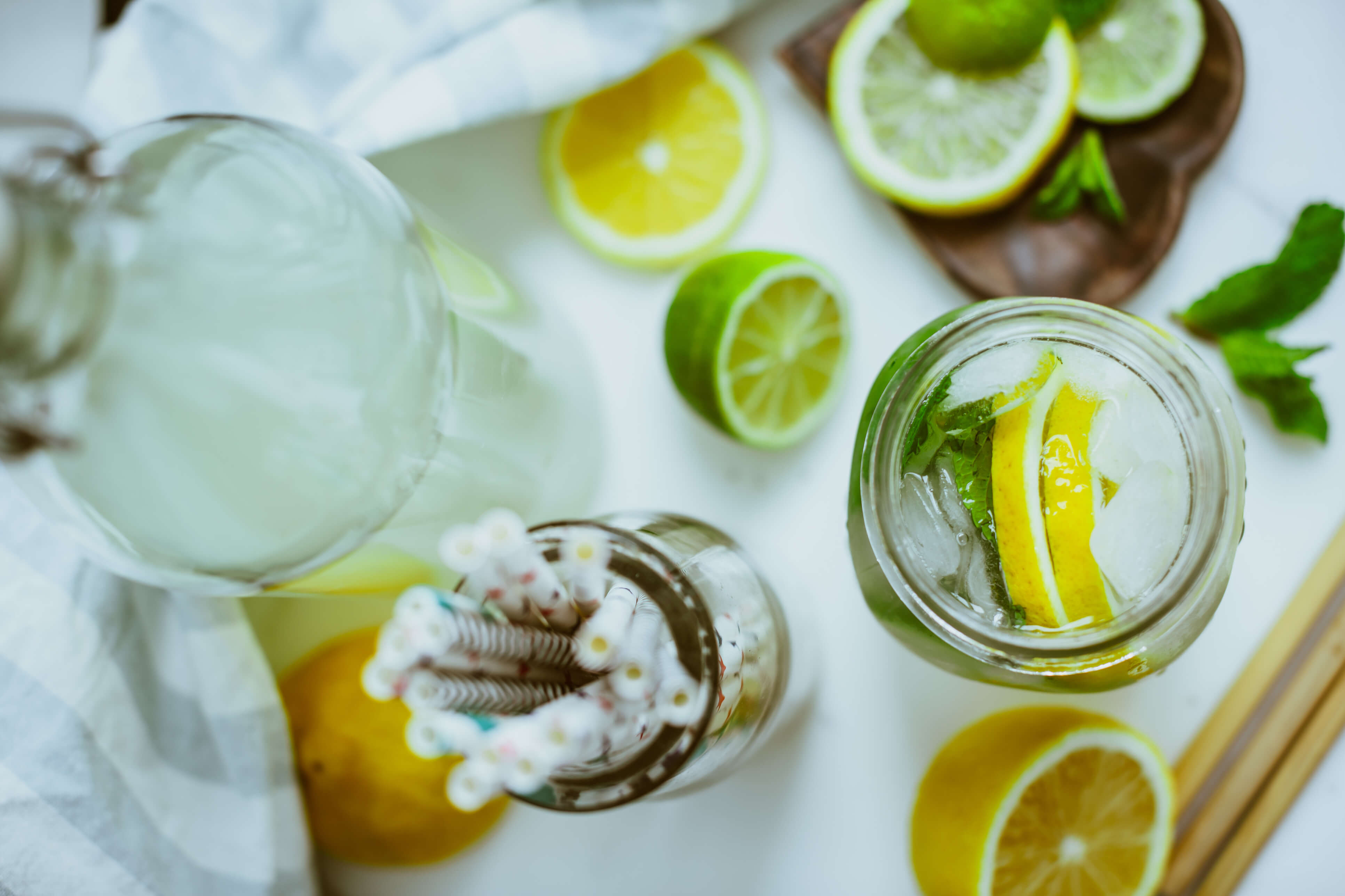 Tom Collins with a twist of lemon can be a very refreshing cocktail.