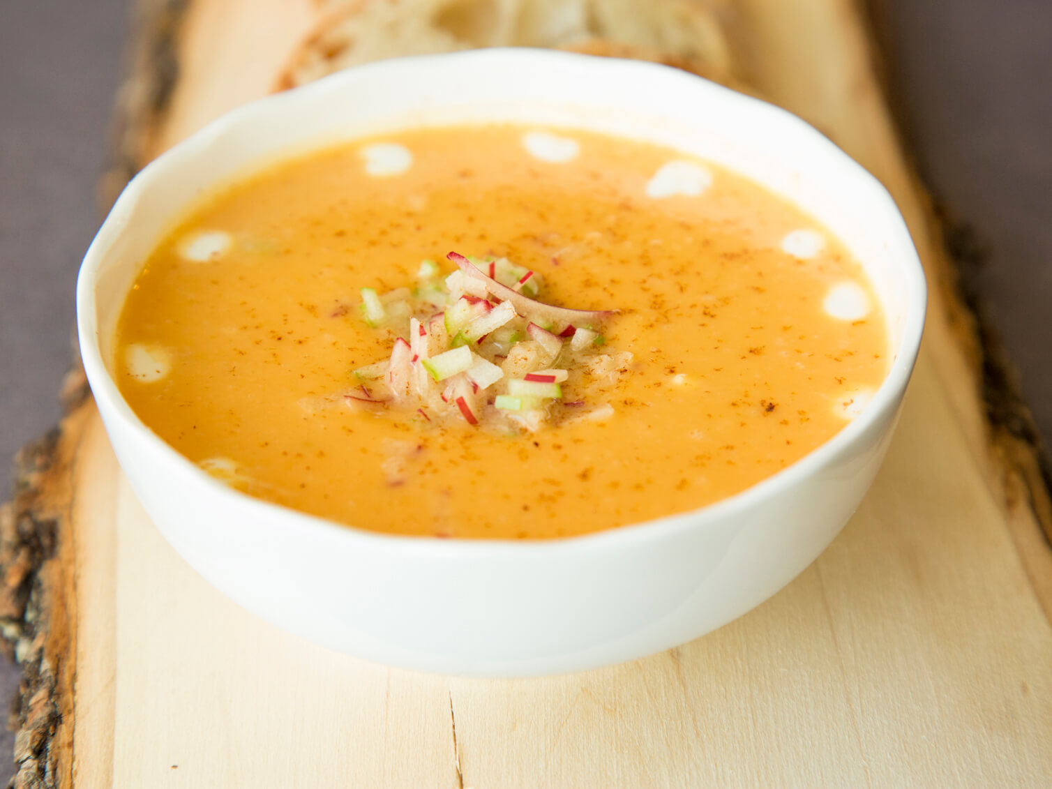 You can garnish the soup with creme fraiche, shaved radishes and green onions.