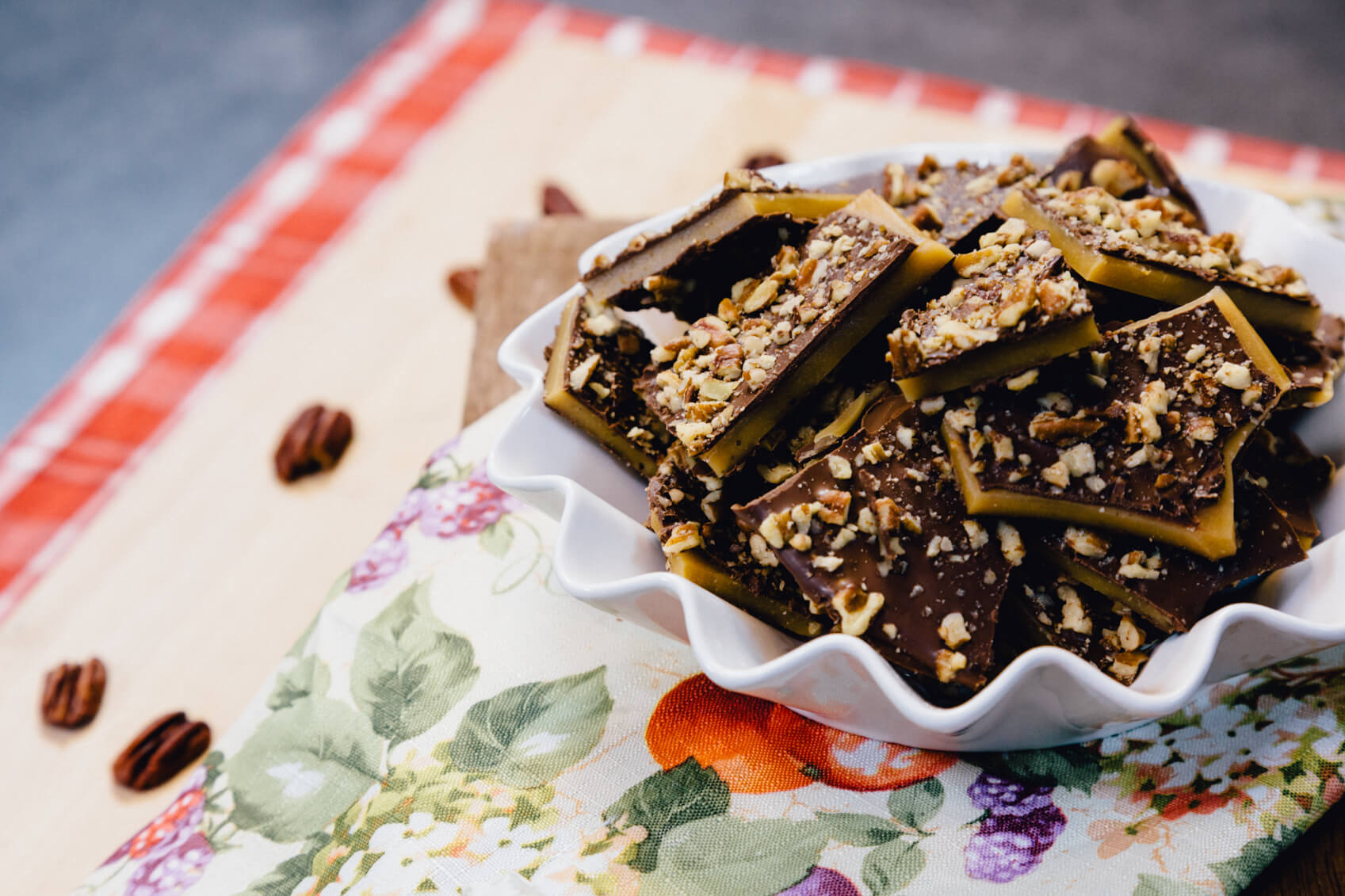You can top your toffee with chocolate and chopped nuts.