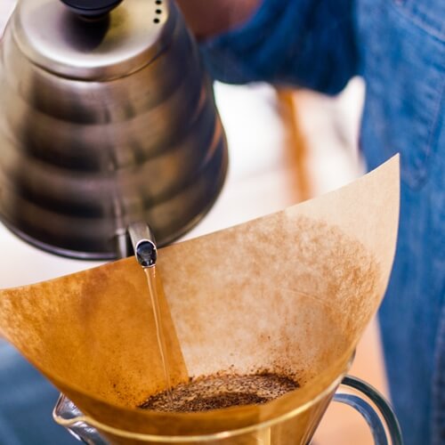 Use a gooseneck kettle for an even pour.