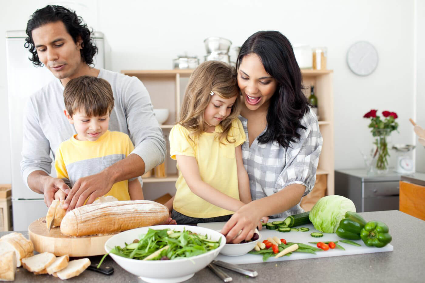 Parents introducing cooking to their children