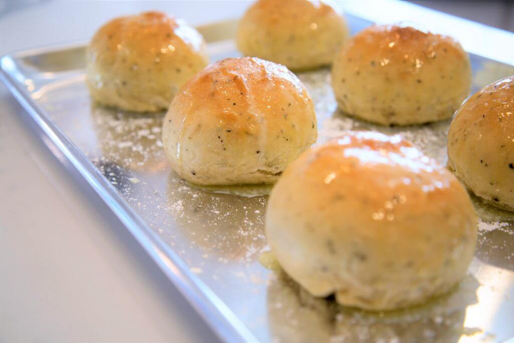 Step up your dinner rolls with this herb and garlic combo!