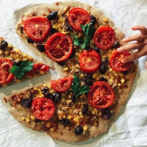 Use fresh produce to make the perfect flatbread pizza.