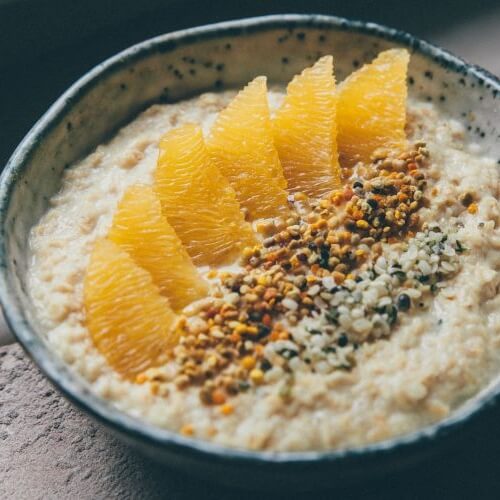 Add oranges and seeds to your porridge for a healthy and unique flavor combination.