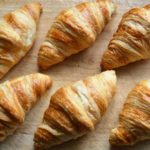 Croissants' buttery texture comes from a process called lamination.