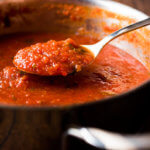Tomato Sauce with Spoon in Metal Pan