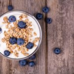 Add your own fruit to yogurt for better health.