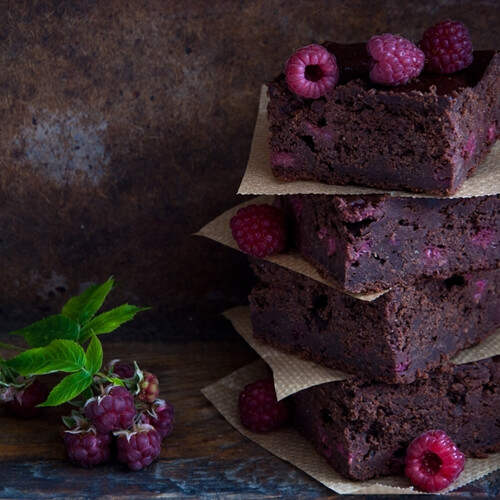 Brownies pair very well with raspberries.