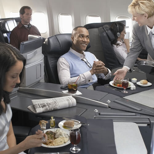 First-class meals have to contend with jet engine noise.